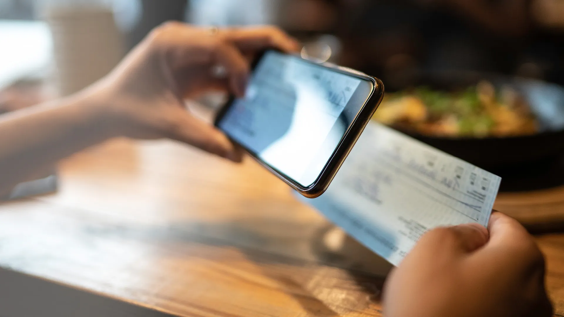 a person holding a phone a person holding a phone
