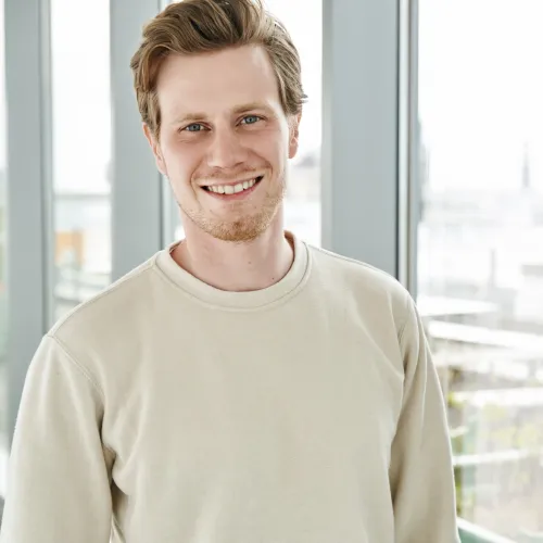 a man smiling at camera