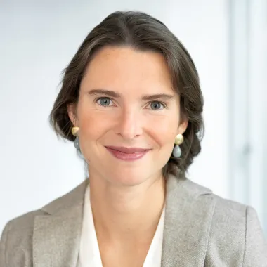 a woman smiling at camera